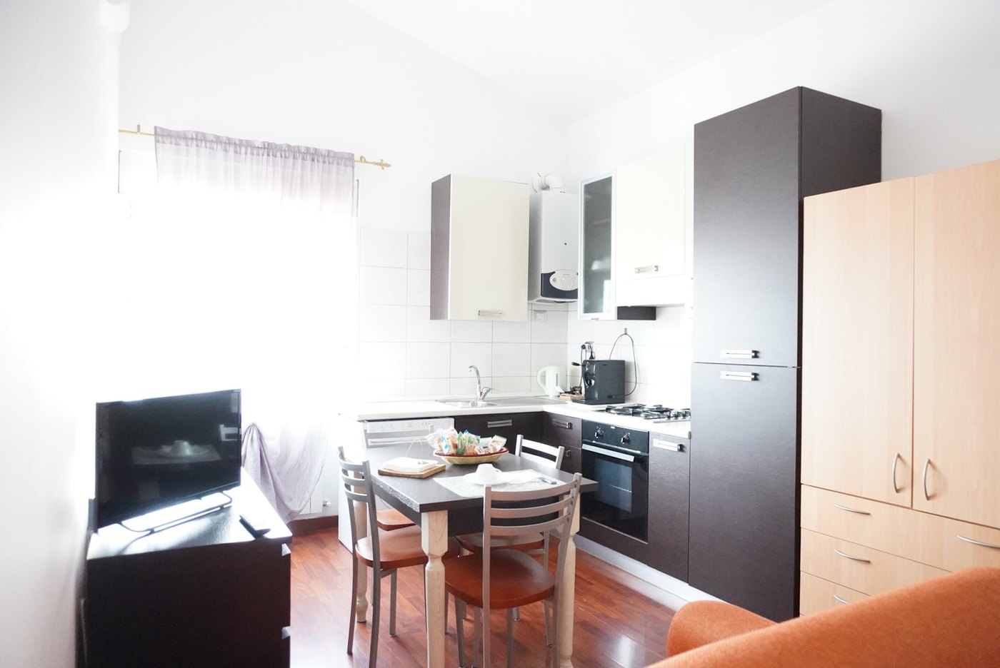 Angolo cottura e zona giorno del bed and breakfast a Potenza